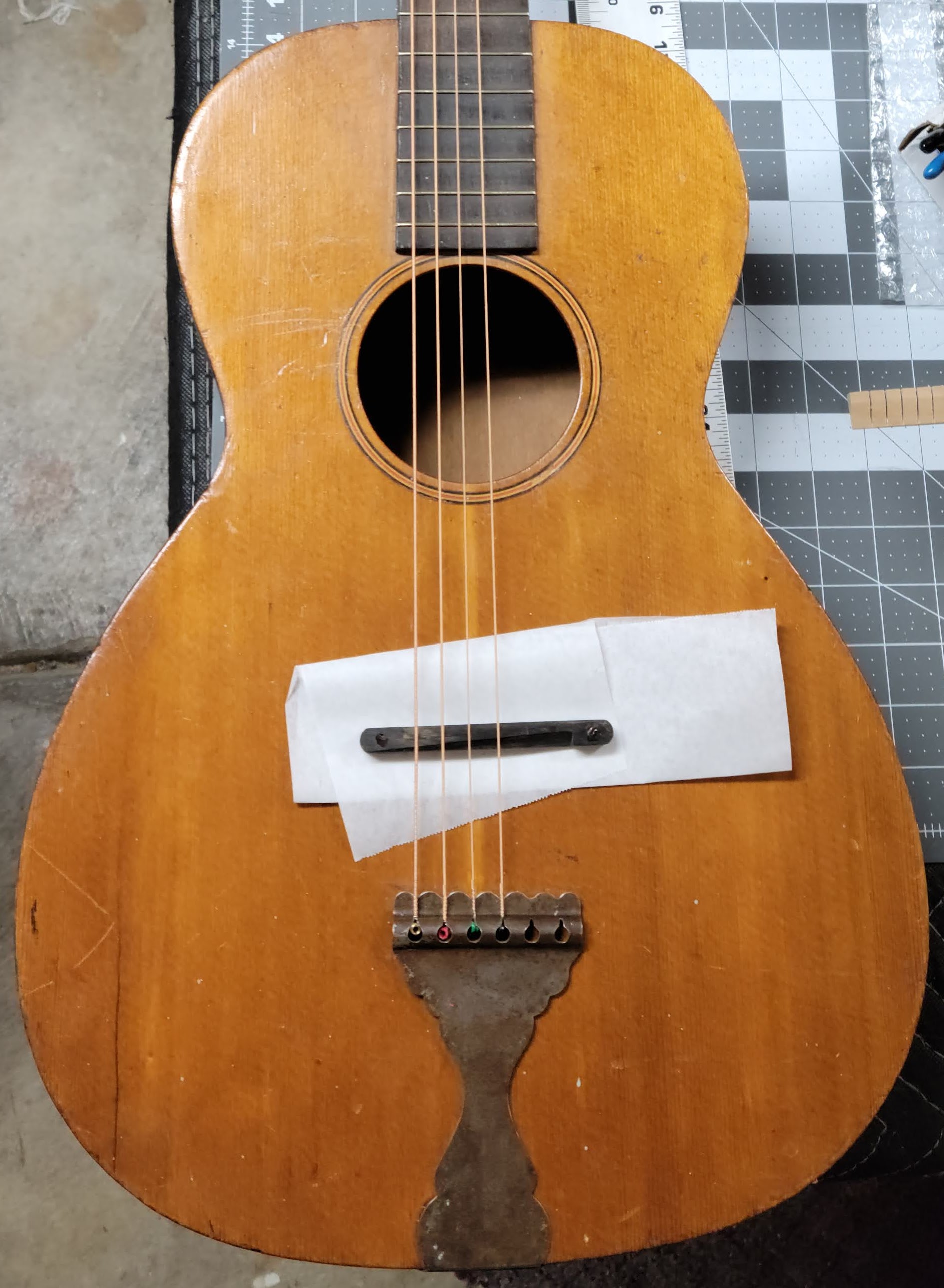 Vintage parlor guitar with new hand-carved bridge